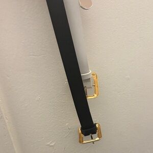 Black and White Belts with Gold Buckles